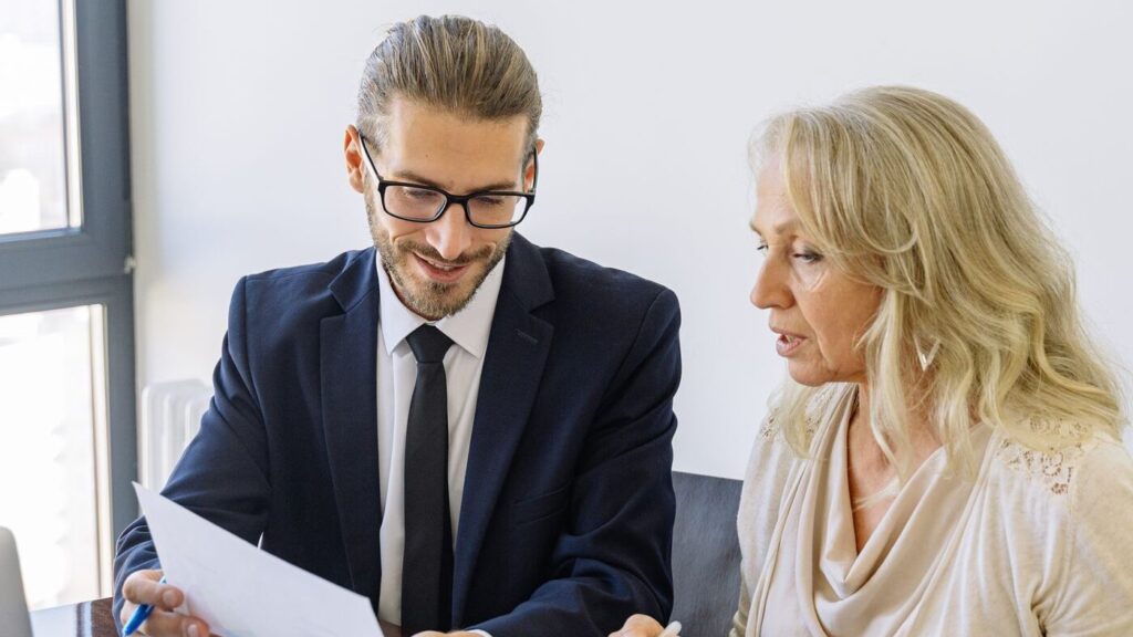 Consultants reviewing strategy documents together